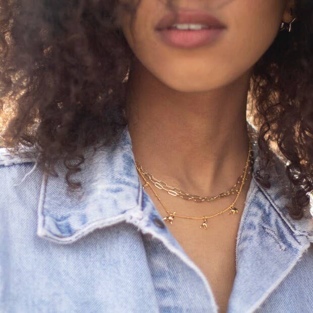 Collier à breloques Dinosaures - Elégance Jurassique en Or