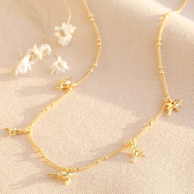 Dinosaur Charm Necklace - Jurassic Elegance in Gold