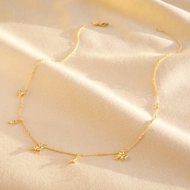 Dinosaur Charm Necklace - Jurassic Elegance in Gold