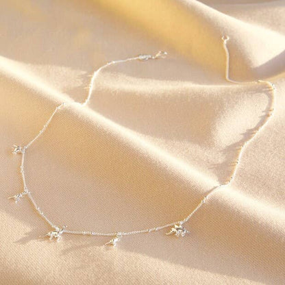 Dinosaurier Charm Halskette - Jurassic Elegance in Gold